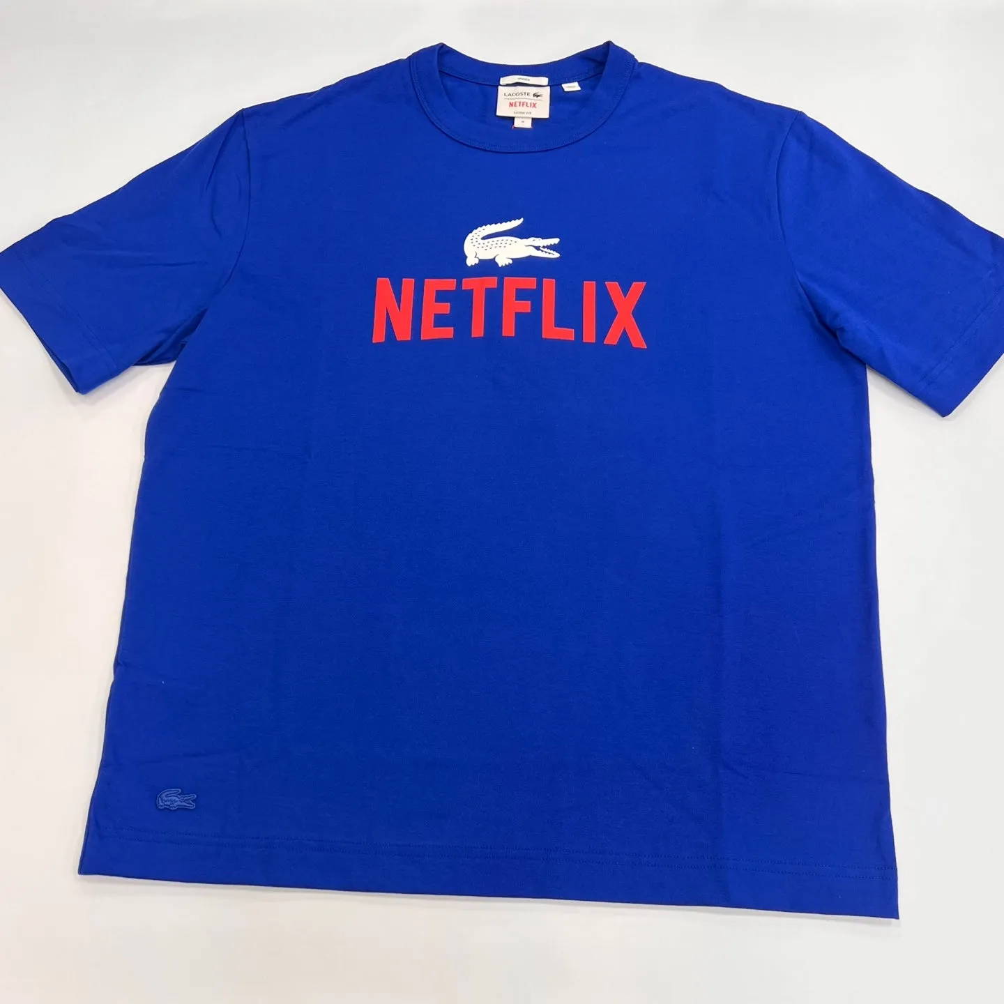 LACOSTE x NETFLIX Unisex Premium Loose-Fit Organic Cotton T-Shirt – Stylish and Eco-Friendly Design